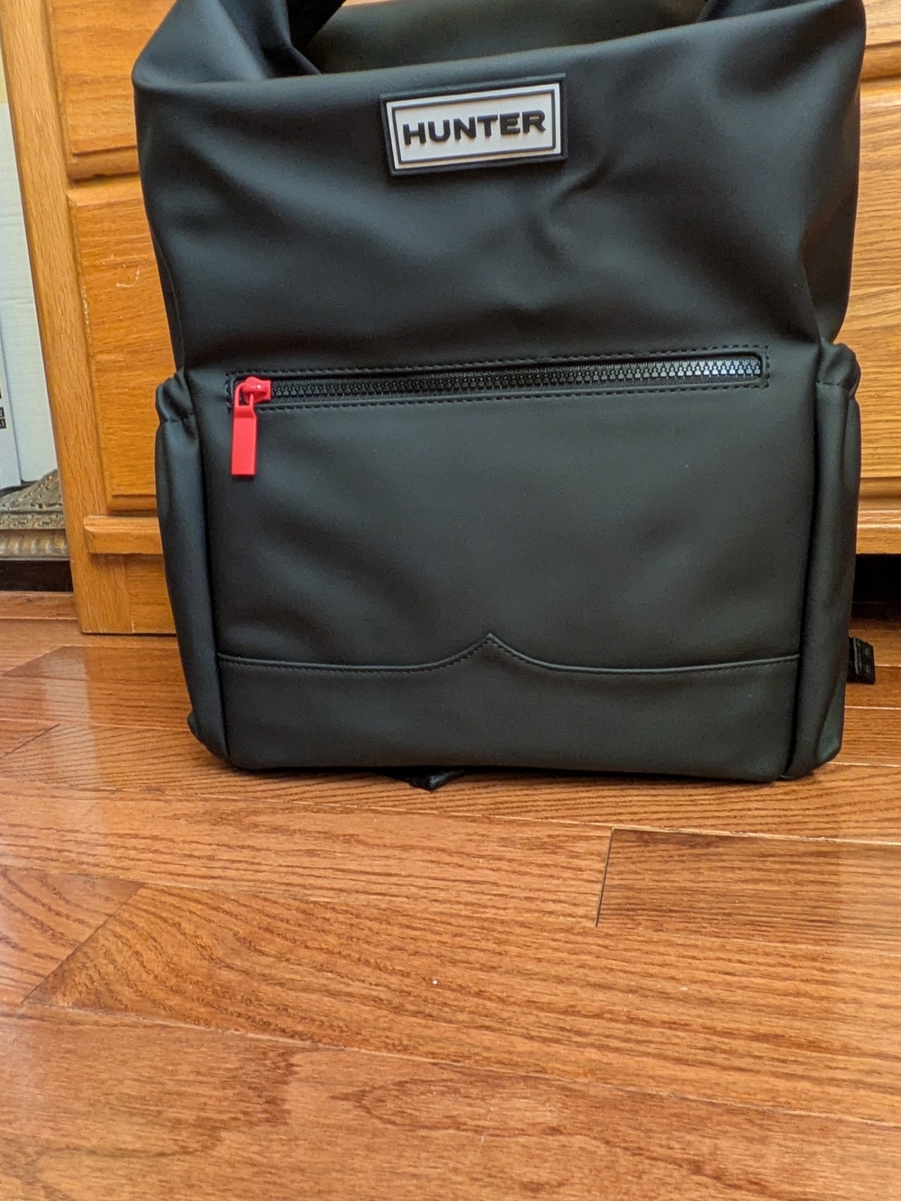 Hunter Black Backpack with Red Zip Pull